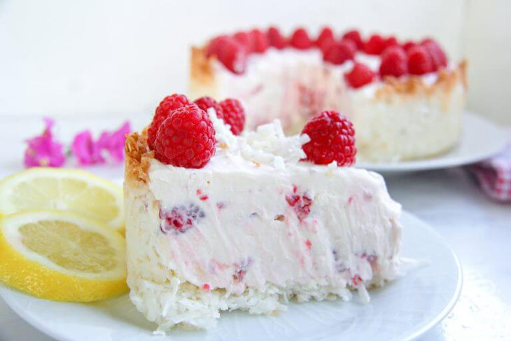 Raspberry flavored keto cheesecake with coconut crust